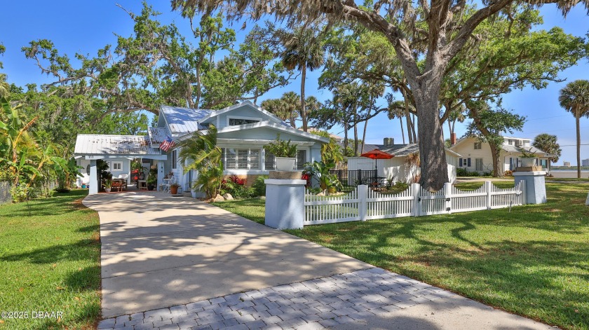 Sweeping Halifax River views & daily breezes abound in this - Beach Home for sale in Port Orange, Florida on Beachhouse.com