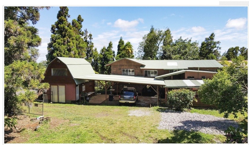 HAWAIIAN HISTORY LIVES AND SPEAKS IN THIS CLASSIC RED FARM HOUSE - Beach Home for sale in Volcano, Hawaii on Beachhouse.com