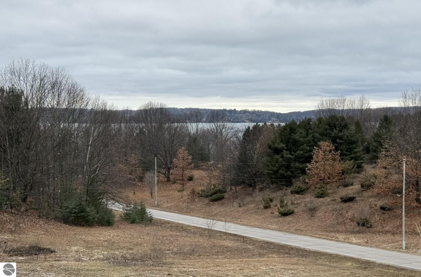 Discover the magic of nature on this sprawling 2+ acre parcel - Beach Acreage for sale in Alden, Michigan on Beachhouse.com
