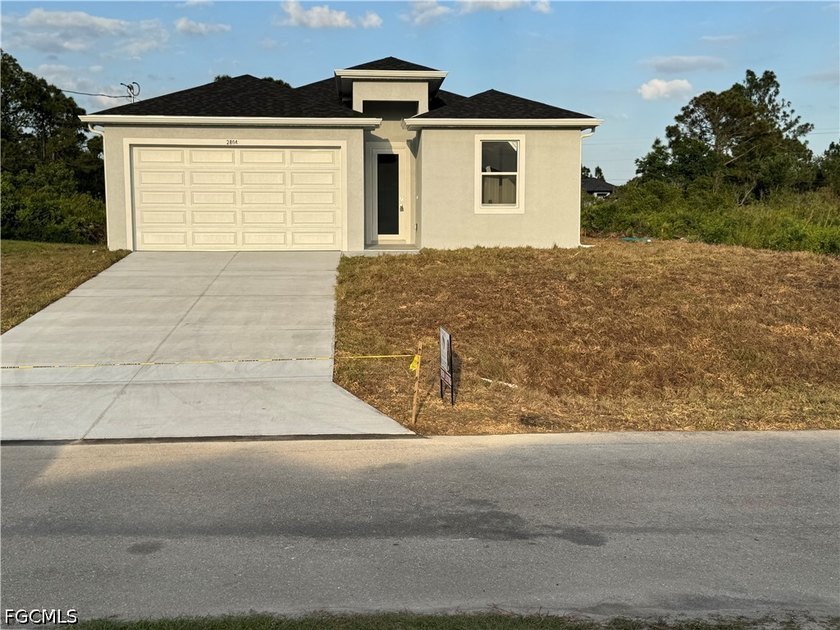 BUILDER SPECIAL!!! New Construction - $10,000 towards buyers - Beach Home for sale in Lehigh Acres, Florida on Beachhouse.com