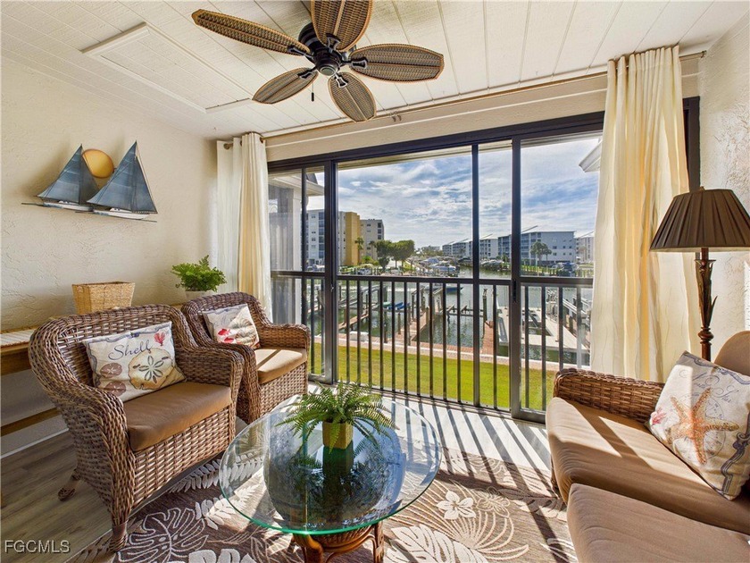 Welcome to your Coastal Chic getaway-where every day begins with - Beach Condo for sale in Fort Myers Beach, Florida on Beachhouse.com