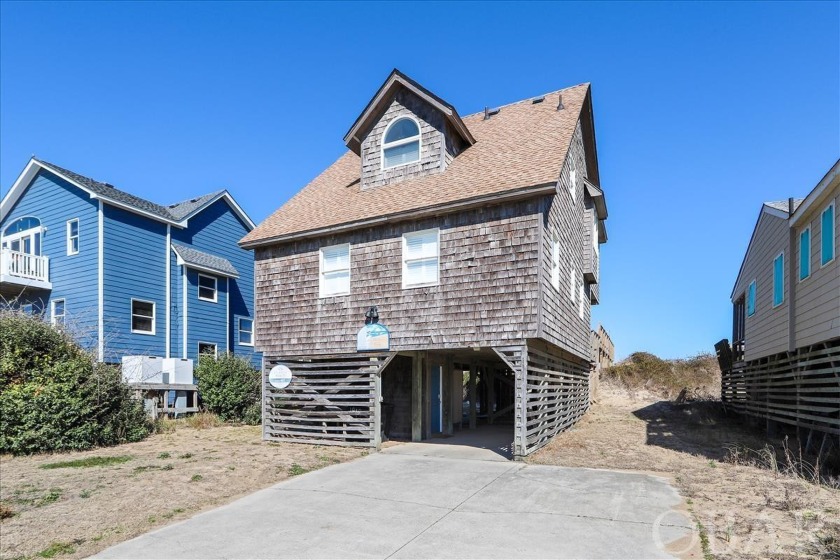 Centrally located to everything in The OBX, this gorgeous - Beach Home for sale in Kill Devil Hills, North Carolina on Beachhouse.com
