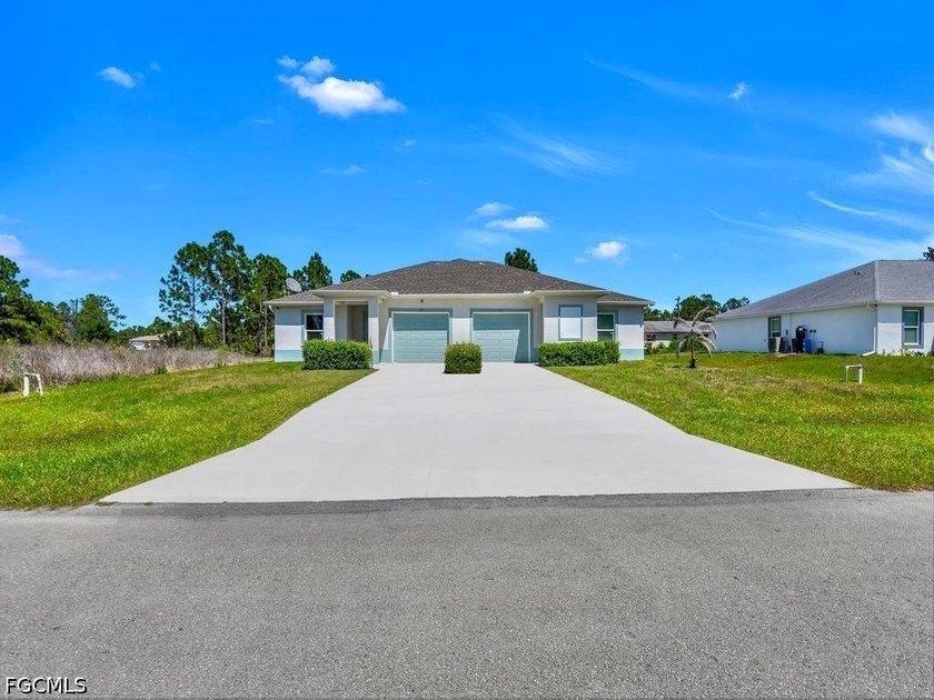 Welcome to this magnificent 2023-built 6-bedroom, 4-bath - Beach Home for sale in Lehigh Acres, Florida on Beachhouse.com