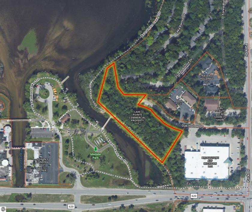 This wooded 2.9 Acre Multi-family Development parcel sits on the - Beach Commercial for sale in Traverse City, Michigan on Beachhouse.com