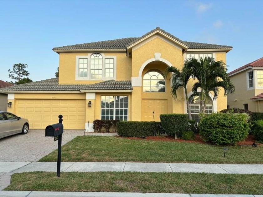 Welcome to a stunning home that exudes both elegance and warmth - Beach Home for sale in West Palm Beach, Florida on Beachhouse.com