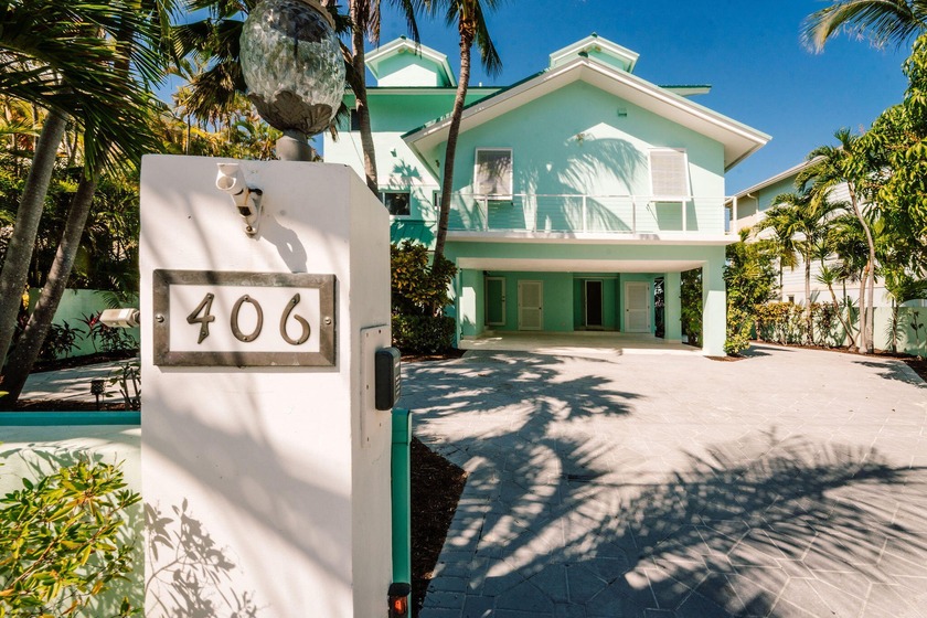 Experience elevated coastal living in this exceptional 4-bedroom - Beach Home for sale in Plantation Key, Florida on Beachhouse.com