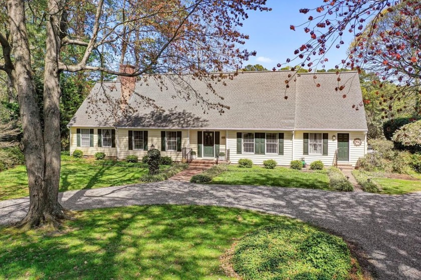 Welcome to this enchanting classic Williamsburg style home with - Beach Home for sale in Irvington, Virginia on Beachhouse.com