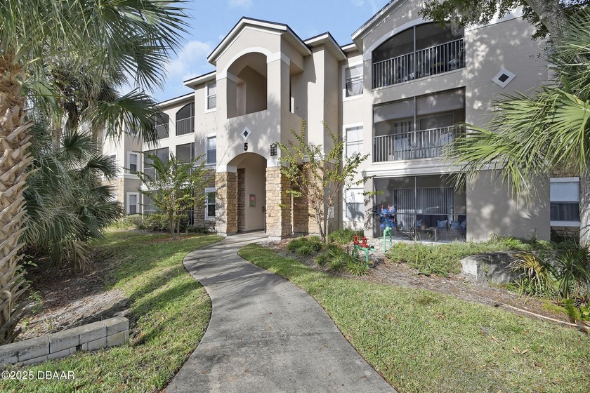 Charming one bedroom GROUND floor lakeside unit with a GARAGE - Beach Condo for sale in Port Orange, Florida on Beachhouse.com