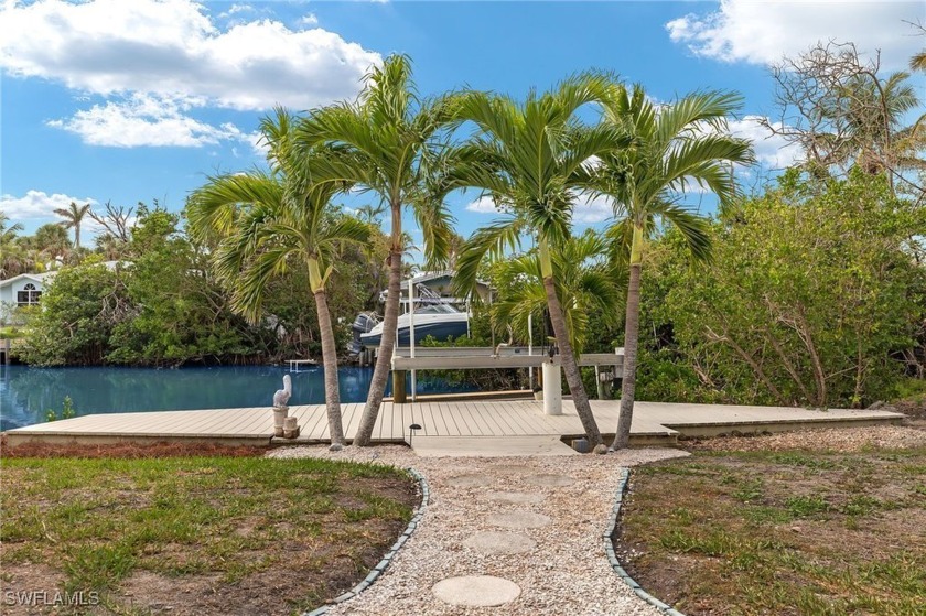 Beautifully renovated, this Gulf access home is less than a mile - Beach Home for sale in Sanibel, Florida on Beachhouse.com