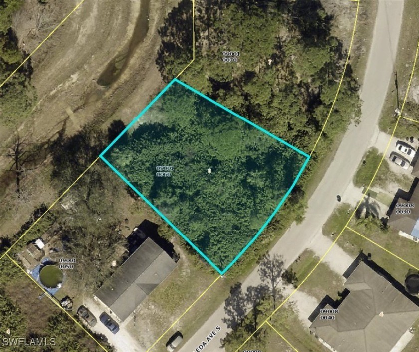 Duplex lot with a canal behind it.  Great opportunity to build - Beach Lot for sale in Lehigh Acres, Florida on Beachhouse.com