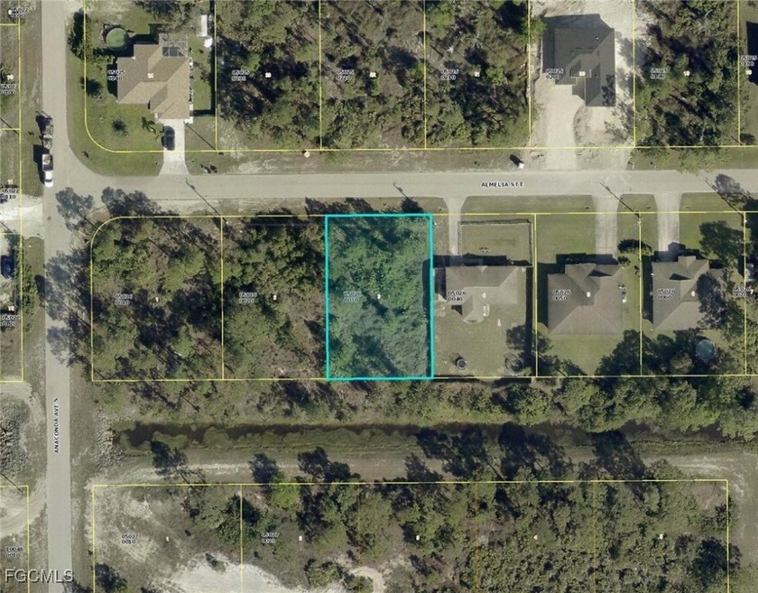 Good looking canal vacant lot few blocks over to State Rd 82 key - Beach Lot for sale in Lehigh Acres, Florida on Beachhouse.com