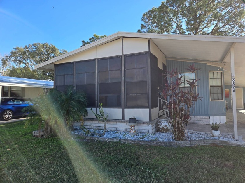 THIS TASTEFULLY DECORATED 2/2 IN THE 55+ COMMUNITY OF HARBORVIEW - Beach Home for sale in New Port Richey, Florida on Beachhouse.com
