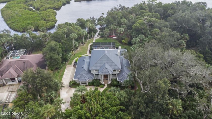 Stunning Waterfront Pool Estate in Gated Palmas Bay Club - - Beach Home for sale in Port Orange, Florida on Beachhouse.com