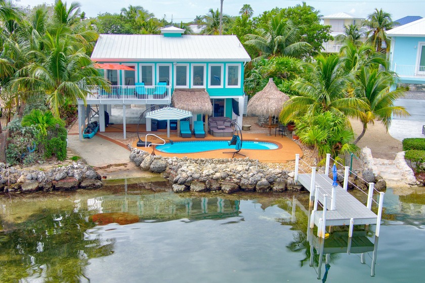Experience waterfront living in the highly desirable Breezeswept - Beach Home for sale in Ramrod Key, Florida on Beachhouse.com