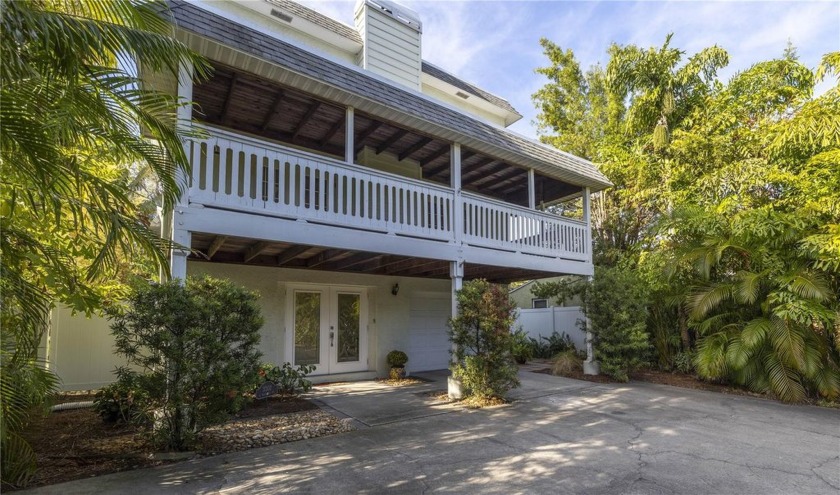 SOLID CONCRETE BLOCK, ELEVATED HOME with HURRICANE IMPACT - Beach Home for sale in ST Pete Beach, Florida on Beachhouse.com