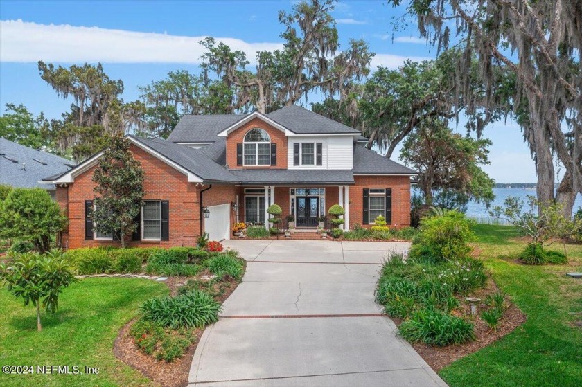 Nestled in a tiny enclave of only 5 homes, this expertly - Beach Home for sale in Fleming Island, Florida on Beachhouse.com