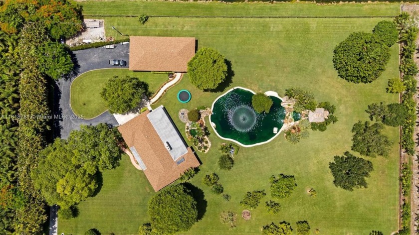 Secluded tropical oasis in the heart of the Redland! This 4 bed - Beach Home for sale in Homestead, Florida on Beachhouse.com