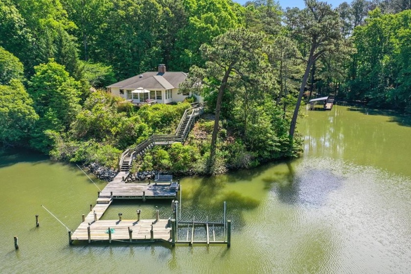 Nestled on over 2 wooded, private acres, this river home offers - Beach Home for sale in Lancaster, Virginia on Beachhouse.com