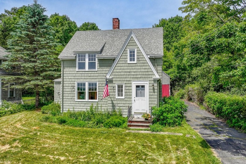 Step into timeless charm with this classic early 1900s Colonial - Beach Home for sale in Rockland, Maine on Beachhouse.com