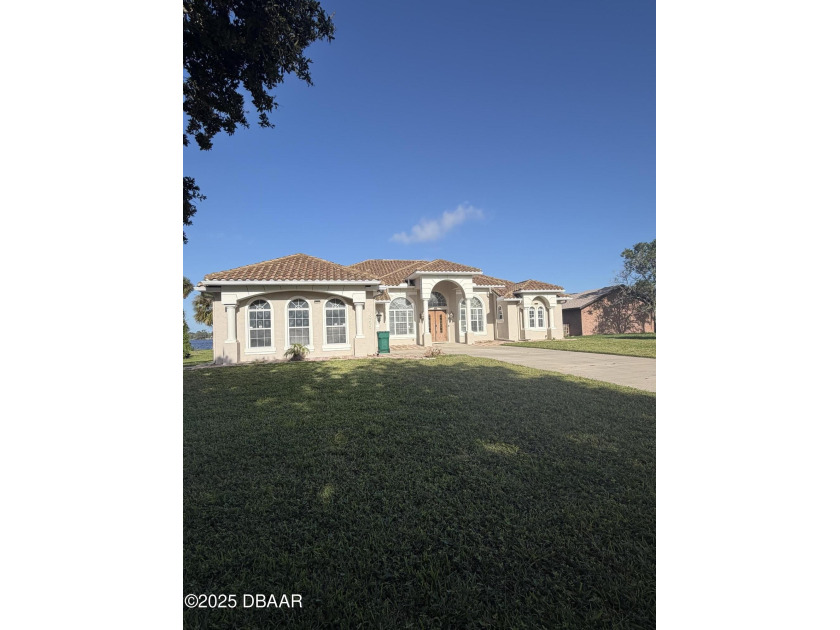 Watch the sunrise over the Halifax river with spectacular - Beach Home for sale in Holly Hill, Florida on Beachhouse.com