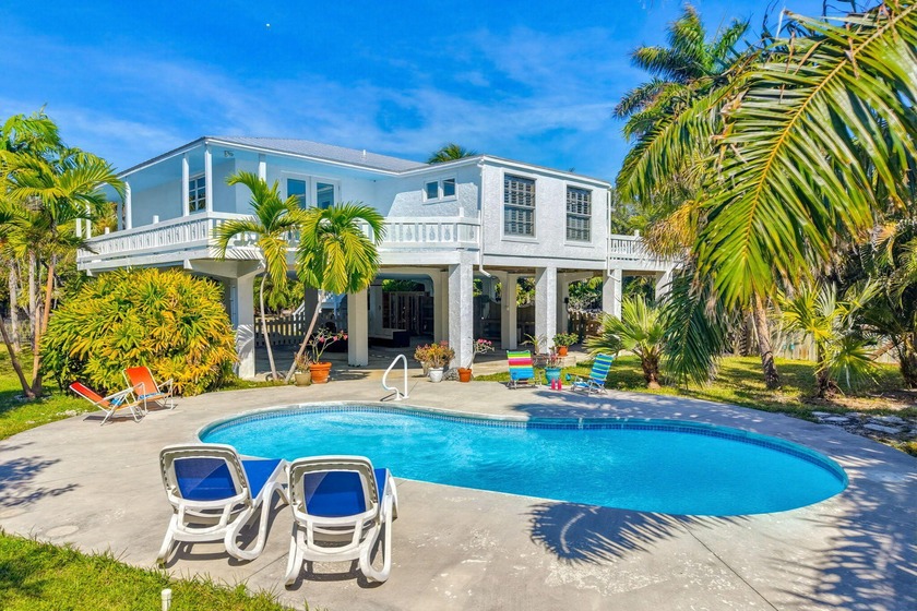 Situated on a secluded acre just 20 minutes from Key West, this - Beach Home for sale in Cudjoe Key, Florida on Beachhouse.com