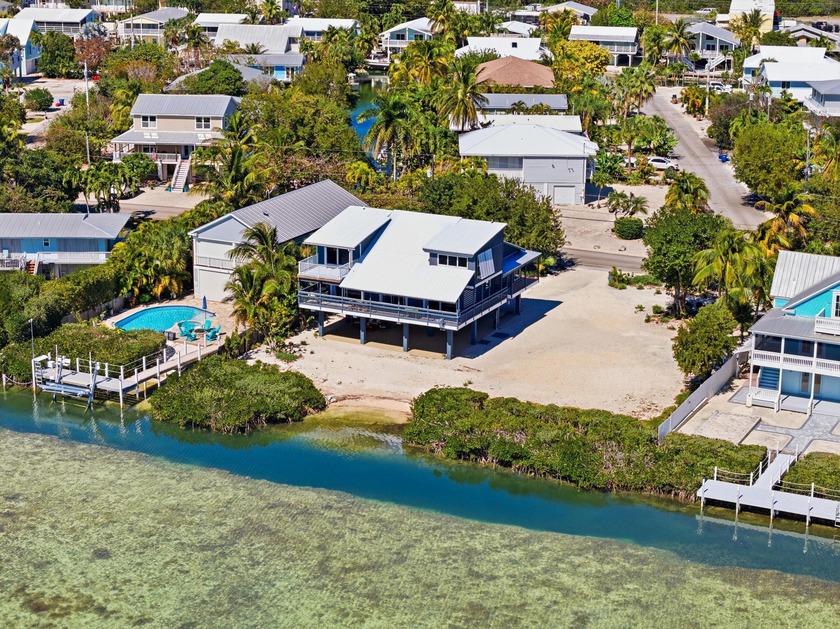 FULLY RESTORED! This 4-bedroom, 3-bathroom home is a testament - Beach Home for sale in Cudjoe Key, Florida on Beachhouse.com