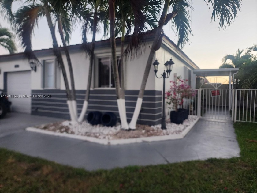 Charming lakefront single-family home boasting modern updates - Beach Home for sale in Miami, Florida on Beachhouse.com
