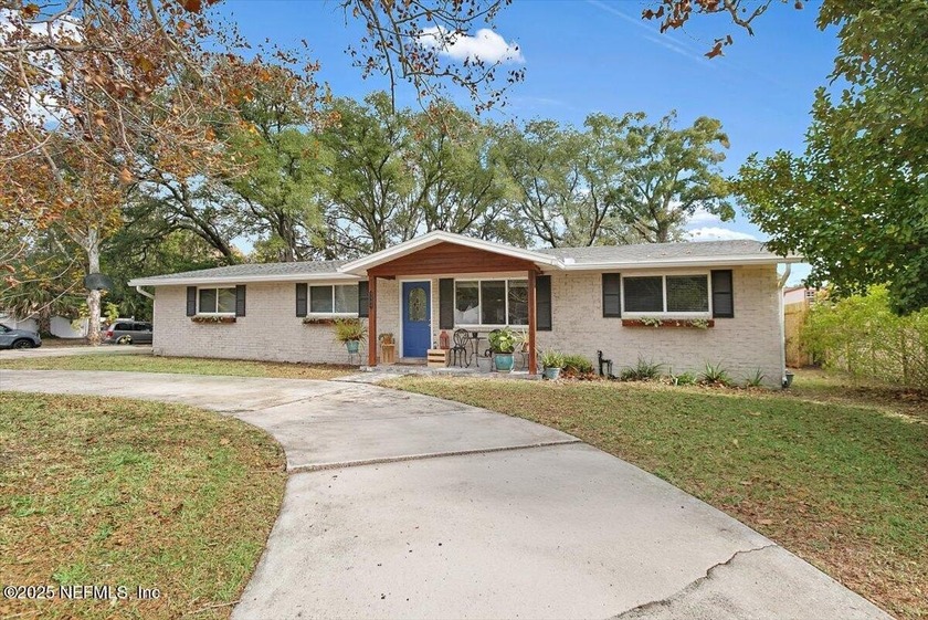 This inviting 3BR/2BA Isle of Palms gem offers the perfect blend - Beach Home for sale in Jacksonville, Florida on Beachhouse.com