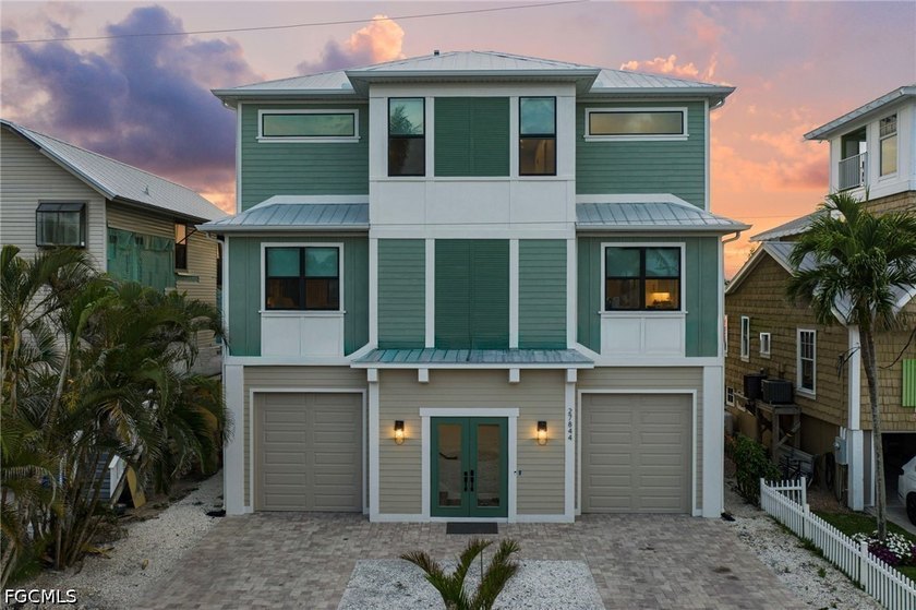 This 2021 coastal custom home captures the easy rhythm of Bonita - Beach Home for sale in Bonita Springs, Florida on Beachhouse.com