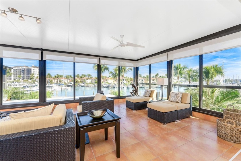 Wake up to sweeping marina views and front-row seats to Burnt - Beach Condo for sale in Punta Gorda, Florida on Beachhouse.com