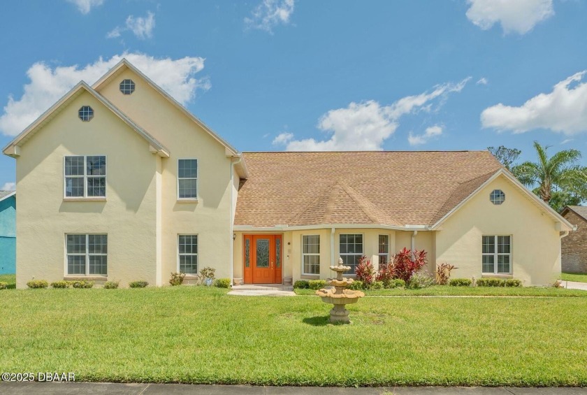 Step into this beautifully designed home in a beautifully - Beach Home for sale in Daytona Beach, Florida on Beachhouse.com