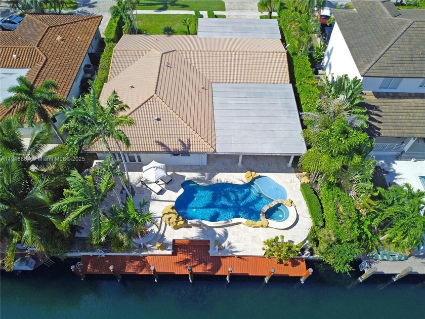 Welcome to this updated 4 bedroom, 3.5 bath waterfront residence - Beach Home for sale in North Miami, Florida on Beachhouse.com