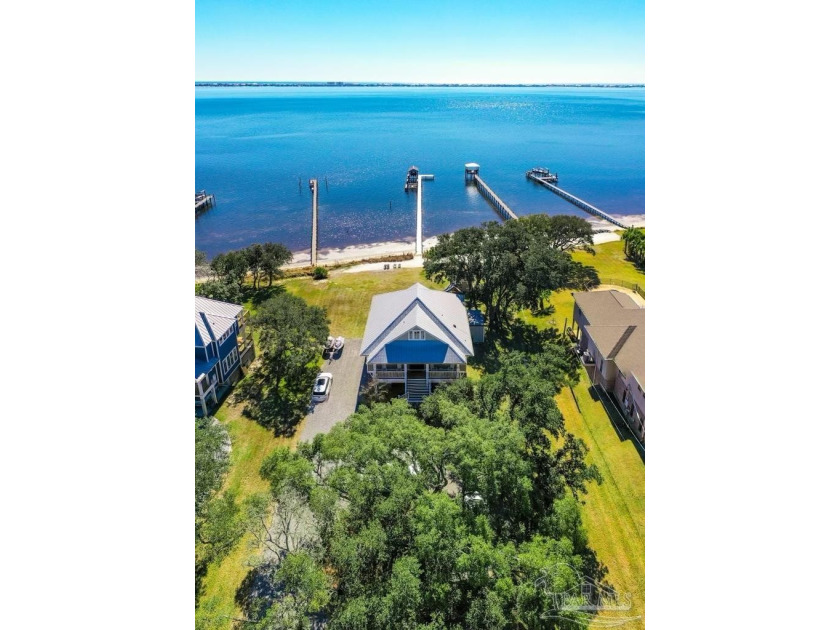 Upscale, waterfront property with 120' on Santa Rosa Sound and a - Beach Home for sale in Gulf Breeze, Florida on Beachhouse.com