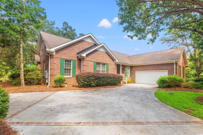 Welcome to this pure gem, tucked away in a secluded corner of - Beach Home for sale in Pawleys Island, South Carolina on Beachhouse.com