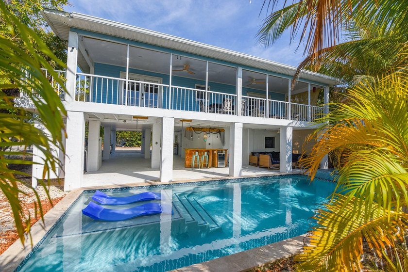 A true tropical oasis nestled on a 6,600 sq ft lot with lush - Beach Home for sale in Big Pine Key, Florida on Beachhouse.com