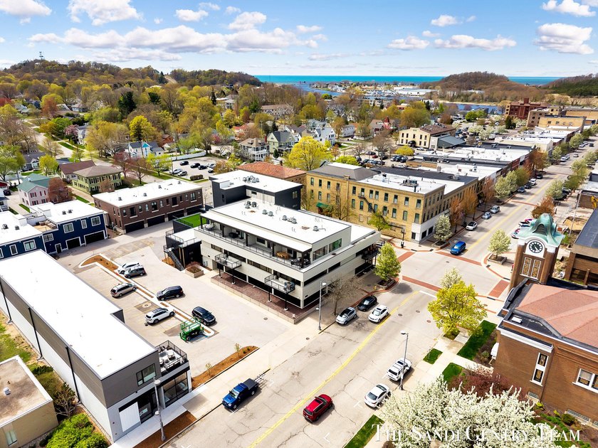 Discover an elevated take on lakeshore living in this - Beach Condo for sale in Grand Haven, Michigan on Beachhouse.com