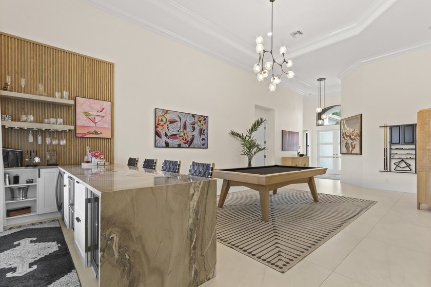 Experience the pinnacle of turnkey luxury in this impeccably - Beach Home for sale in Palm Beach Gardens, Florida on Beachhouse.com