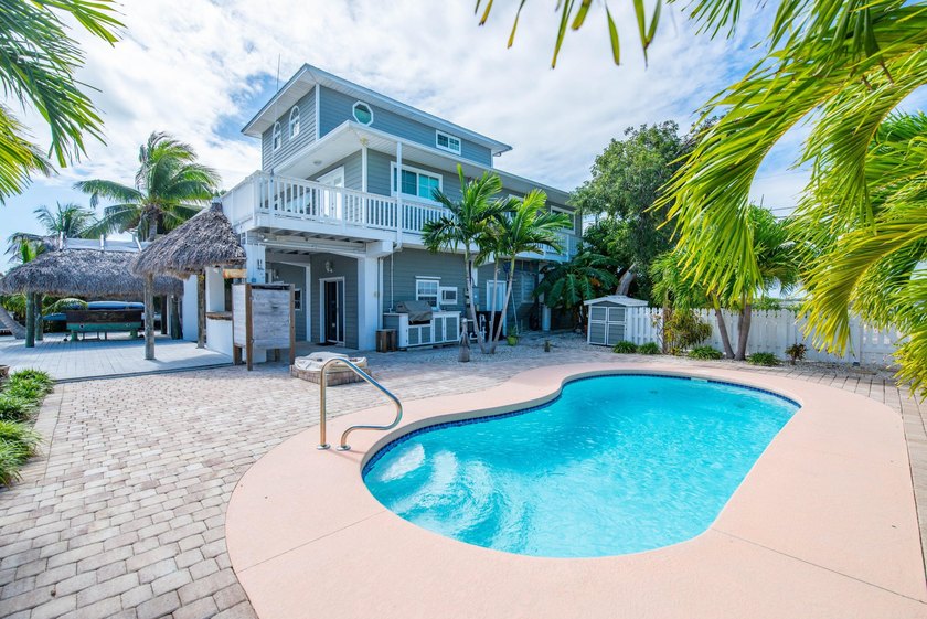 Nestled on the picturesque shores of Ramrod Key, this stunning - Beach Home for sale in Ramrod Key, Florida on Beachhouse.com
