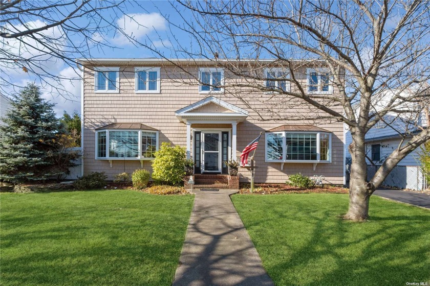 Prepare to indulge in waterfront living at its finest! This - Beach Home for sale in Massapequa, New York on Beachhouse.com