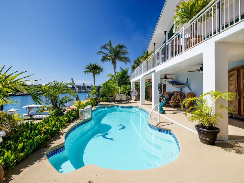 Welcome to a rare waterfront estate positioned along a 200-foot - Beach Home for sale in Marathon, Florida on Beachhouse.com