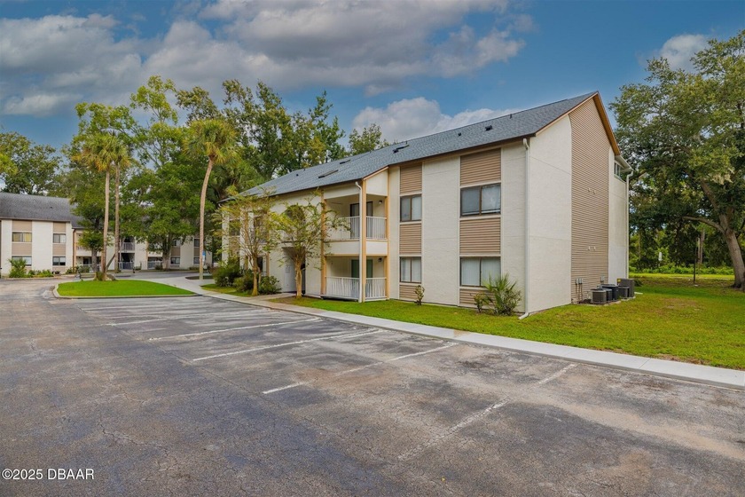Welcome to easy, carefree living in this updated first-floor end - Beach Condo for sale in Port Orange, Florida on Beachhouse.com