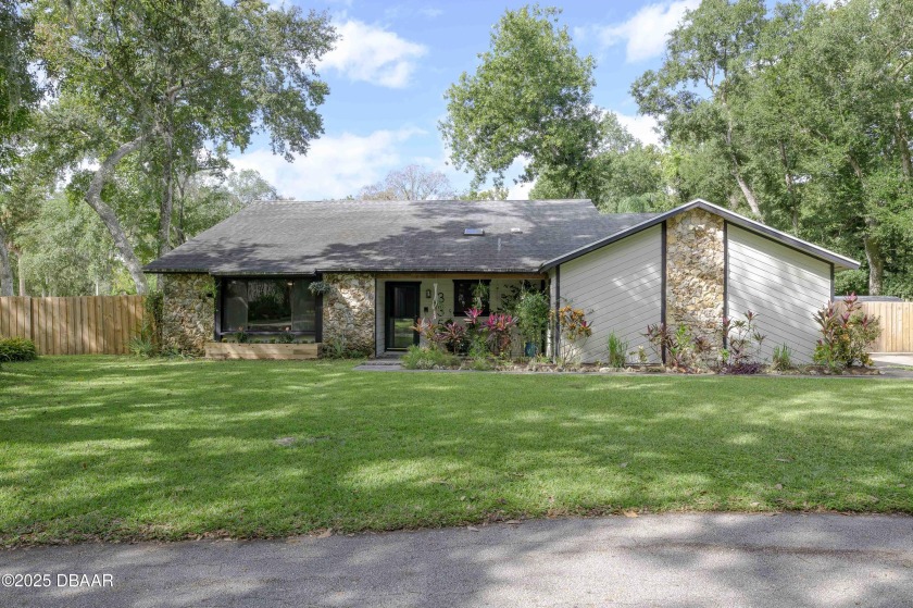 Plant Lover's Dream in Gated Tymber Creek! Beautiful 4 bedroom - Beach Home for sale in Ormond Beach, Florida on Beachhouse.com