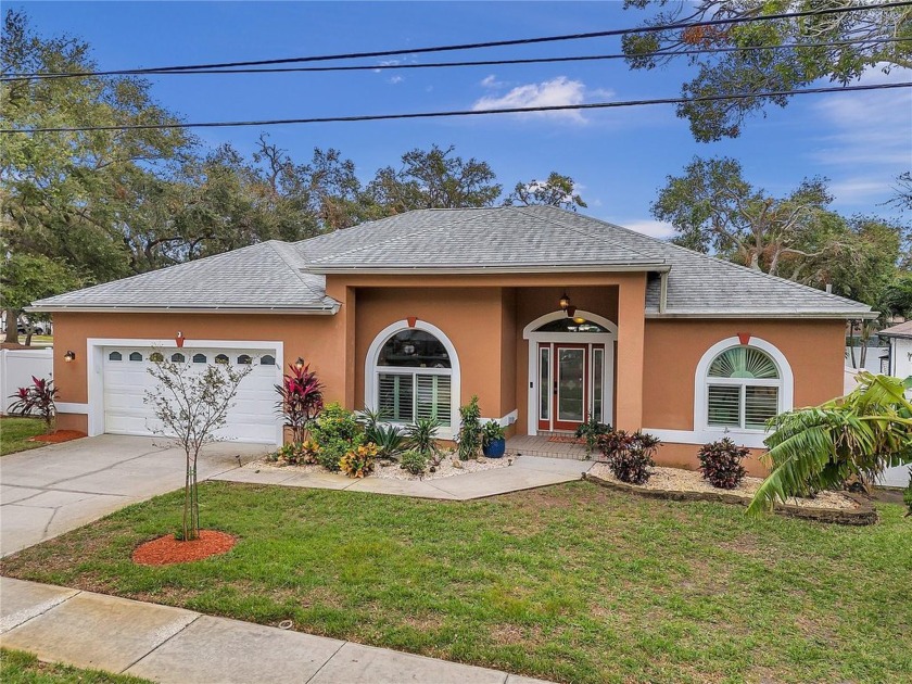 LUXURY LIVING MADE EASY - STUNNING SEMINOLE HOME WITH UPGRADES - Beach Home for sale in Seminole, Florida on Beachhouse.com