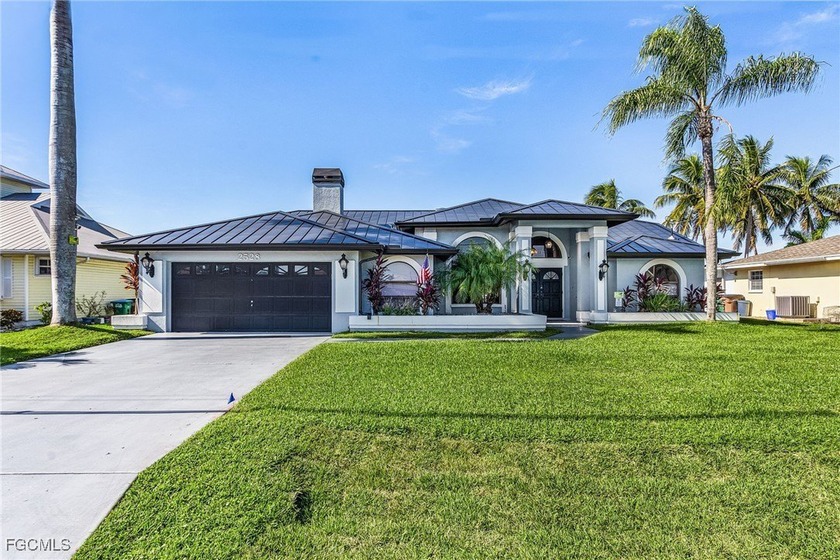 Beautifully upgraded 3Bed/2Bath Gulf access home with porcelain - Beach Home for sale in Cape Coral, Florida on Beachhouse.com