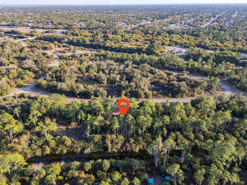 This canal front, buildable residential lot offers strong upside - Beach Lot for sale in North Port, Florida on Beachhouse.com