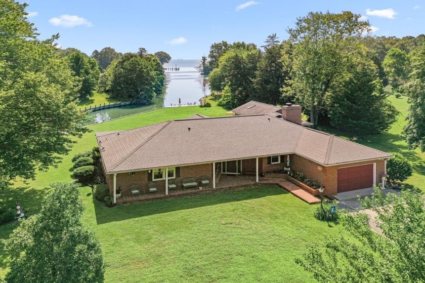 Discover serene luxury in this beautifully updated brick - Beach Home for sale in Kilmarnock, Virginia on Beachhouse.com