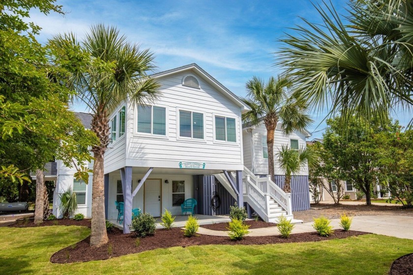 This coastal retreat is just a few steps away from the beach and - Beach Home for sale in Isle of Palms, South Carolina on Beachhouse.com