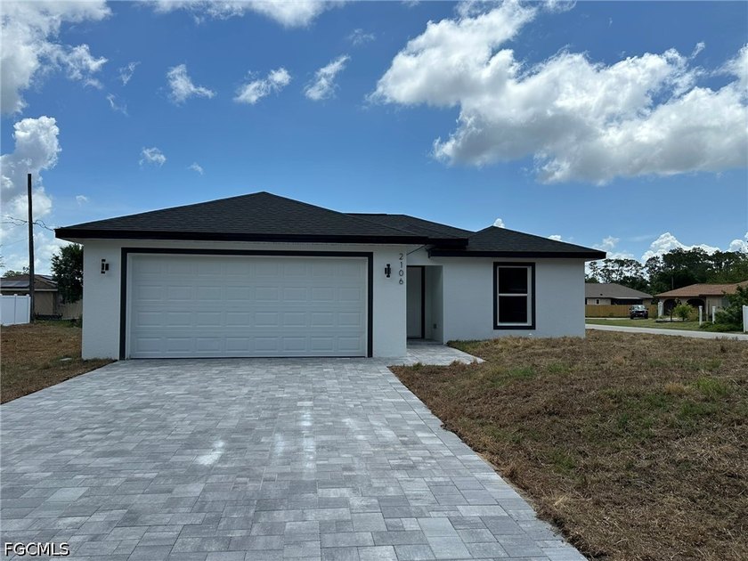New construction corner lot 3-bedroom, 2-bath home with a 2-car - Beach Home for sale in Port Charlotte, Florida on Beachhouse.com