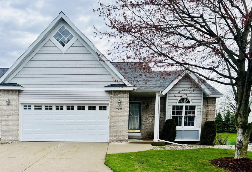 Welcome to 11294 Blue Heron Pkwy. This custom built, 1 owner - Beach Condo for sale in Holland, Michigan on Beachhouse.com