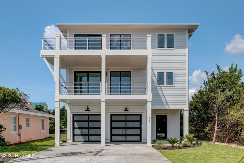 Discover unparalleled coastal living in this stunning newly - Beach Home for sale in Surf City, North Carolina on Beachhouse.com